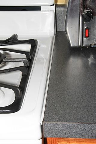 Gap between Stove & Countertop?  Fill it with Door & Window Rubber Weatherseal