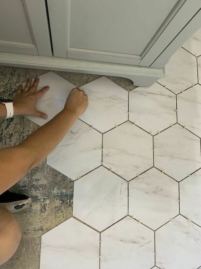 Do you want an updated floor but can't stomach the price tag! I'm sharing with you today how we installed LVT flooring in a bathroom. The price point was amazing and very simple to do it ourselves! It ended up costing just over $1 a square foot which is SO good for this high end look we achieved. This is what the bathroom looked like when I first started helping my friend redo it, a couple months previous to the floor she had replaced the vanity, ripped out the yucky old tile, and pu… Ceramic Floor Tiles, Bathroom Floor Tiles, Bathroom Redo, Small Bathroom, Lvt Bathroom Flooring, Luxury Vinyl Tile Bathroom, Luxury Vinyl Tile Flooring Kitchens, Tile Kitchen Floors, Retro Bathroom Tile