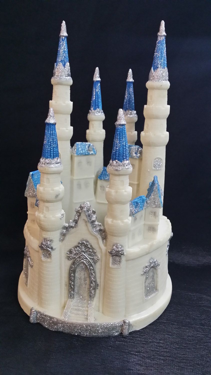 beautiful and elegant off white castle with gold or silver accentsthis princess castle cake