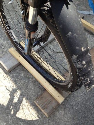 Wood Bike Rack : 5 Steps - Instructables Wood Bike Rack, Truck Bed Bike Rack, Bike Rack Wall, Mountian Bike, Bike Challenge, Build A Bike, Ratchet Straps, Space Organizer, Bike Tire