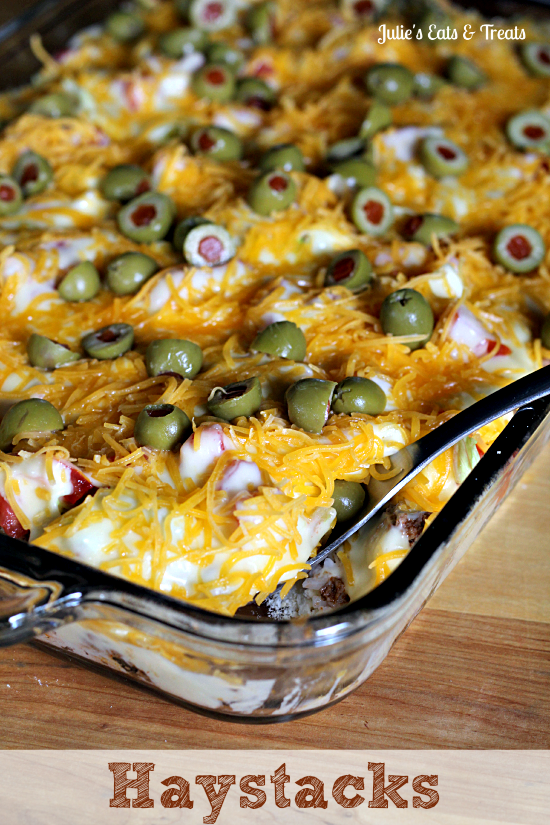 Haystacks Yummy Casserole Full Of Rice And Taco Meat Topped With A Cheese Sauce Lettuce Tomatoes And Olives Via Www Juliese Recipes Yummy Casseroles Food