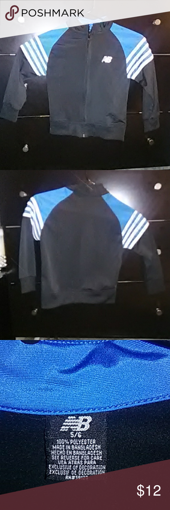 Boys new balance sweater size 5/6 Boys New balance sweater size 5/6 in black and blue New