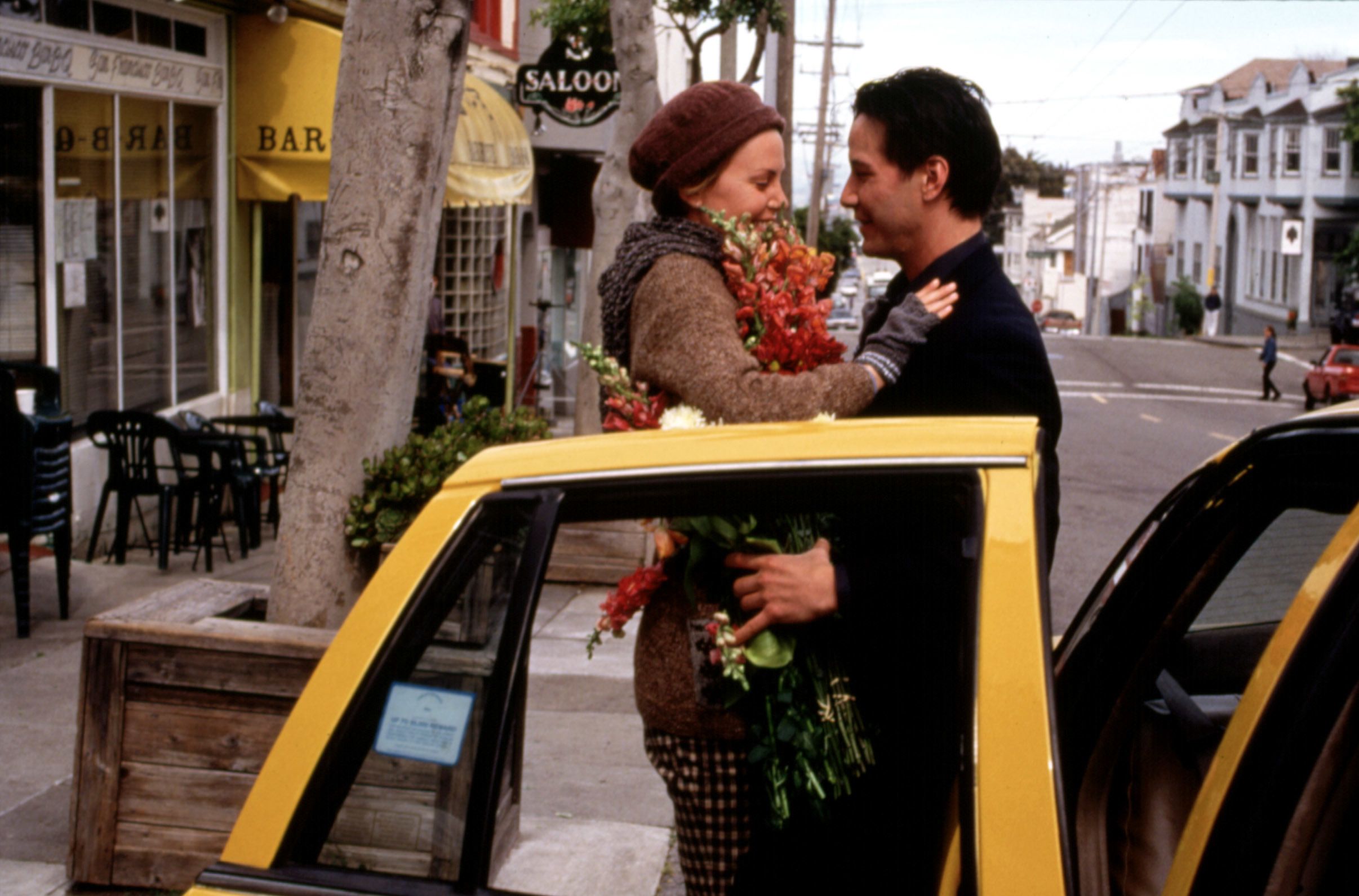 "Sweet November" movie still, 2001. L to R: Charlize Theron, Keanu