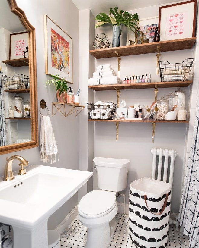 Brighten Up A Dark Bathroom Open Shelving Pastel And Gold Touches Half Moon Hamper Small Bathroom Furniture Classic Small Bathrooms Small Bathroom Decor