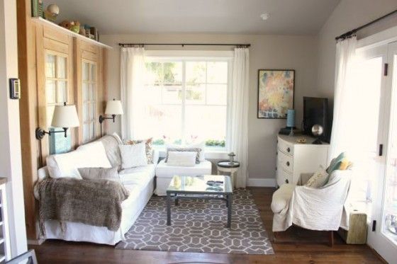 The Walls Are Painted Malibu Beige By Kelly Moore This The Walls Are Painted Malibu Beige By Kelly Moore This Room Is Cozy Not Large Storage Clever And Couch Framed So Well In