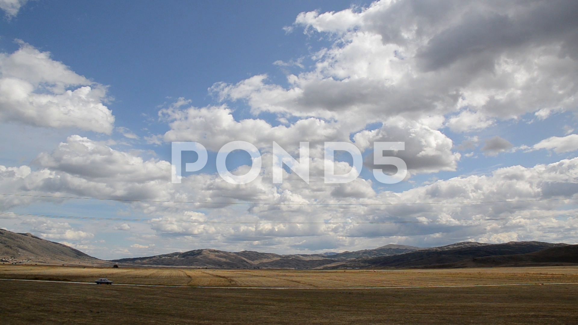 time lapse clouds over