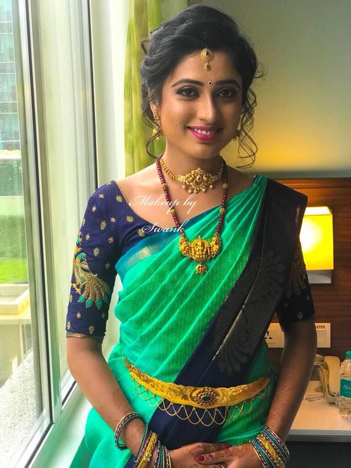 Simple yet elegant, our would-be bride Keerthana paints a pretty picture for her engagement ceremony. Hair and makeup by Team Swank. Bridal silk saree. Saree blouse design. Bridal gold jewellery. Bridal hair. Pink lips. Wedding Saree Blouse Designs, Silk Saree Blouse Designs, Stylish Blouse Design, Blouse Design Models, Bridal Silk Saree, Saree Wedding, Indian Bridal Fashion, Saree Dress, Indian Designer Wear