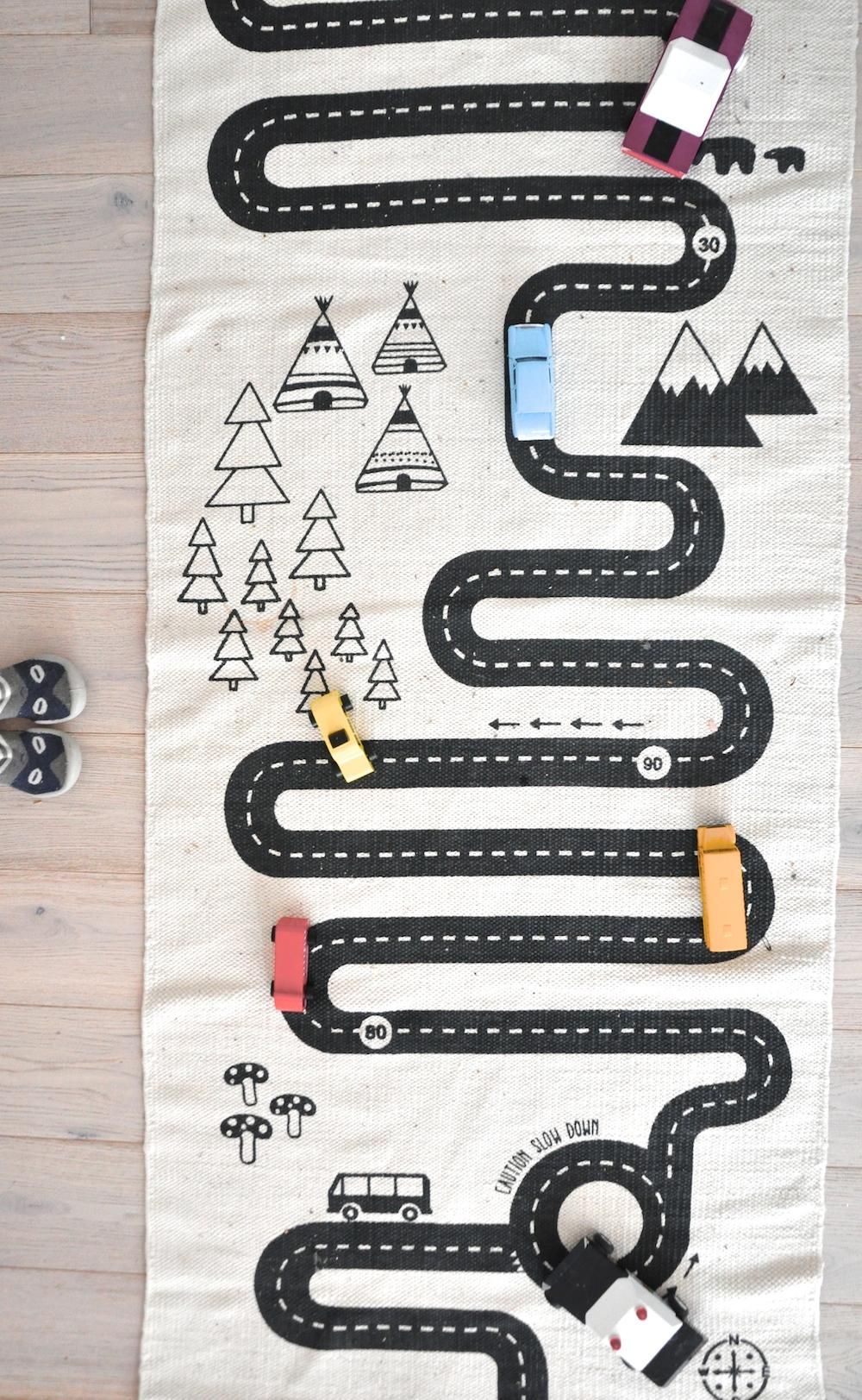White/car track. rectangular cotton rug with a printed pattern at ...