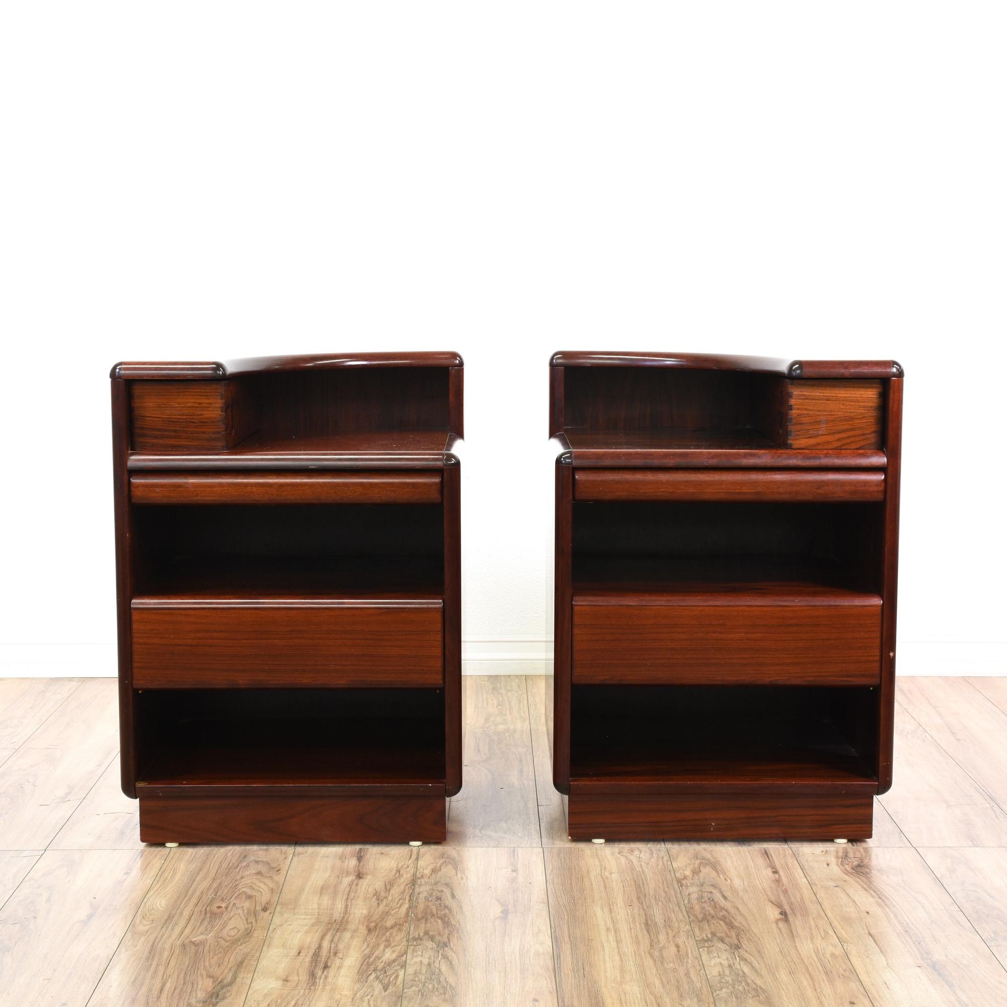 This set of nightstands is featured in a solid teak wood with a