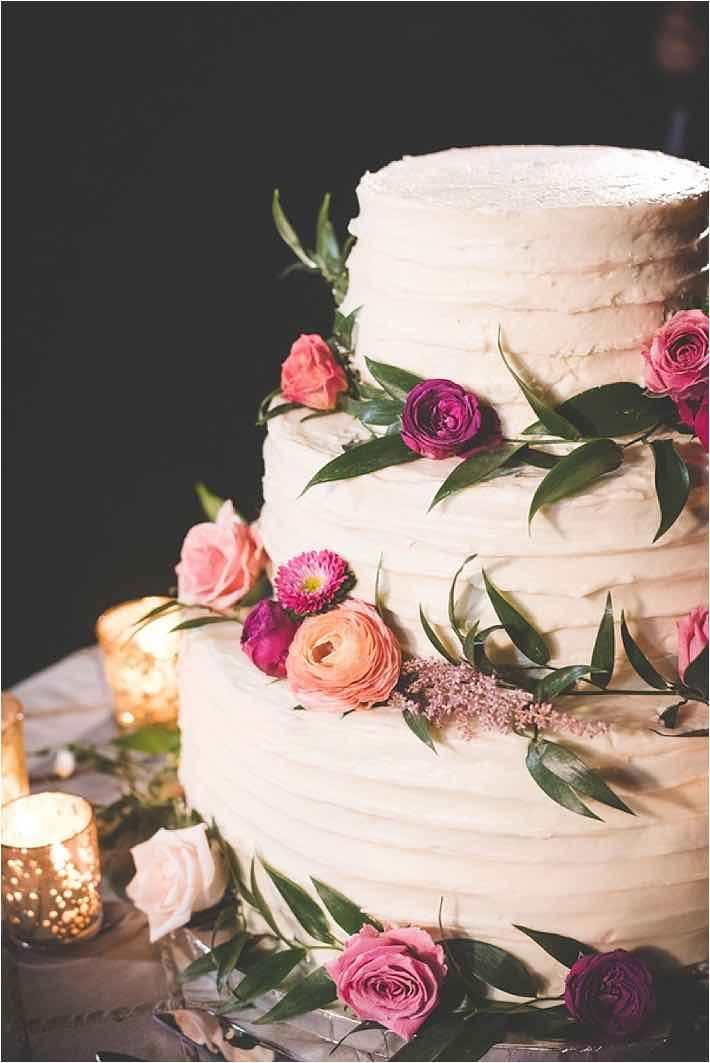 Buttercream With Greenery And Flowers Wedding Cake