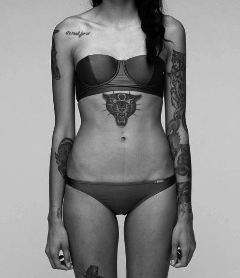 stomach tattoos above belly button
