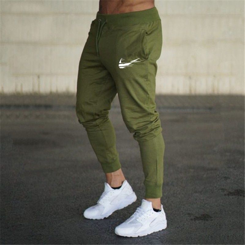 Kaierkang 2019 الرياضية عارضة الرجال اللياقة البدنية تجريب بنطلون Sweatpants نحيل Jogging Pants Men Bodybuilding Pants Mens Pants Casual