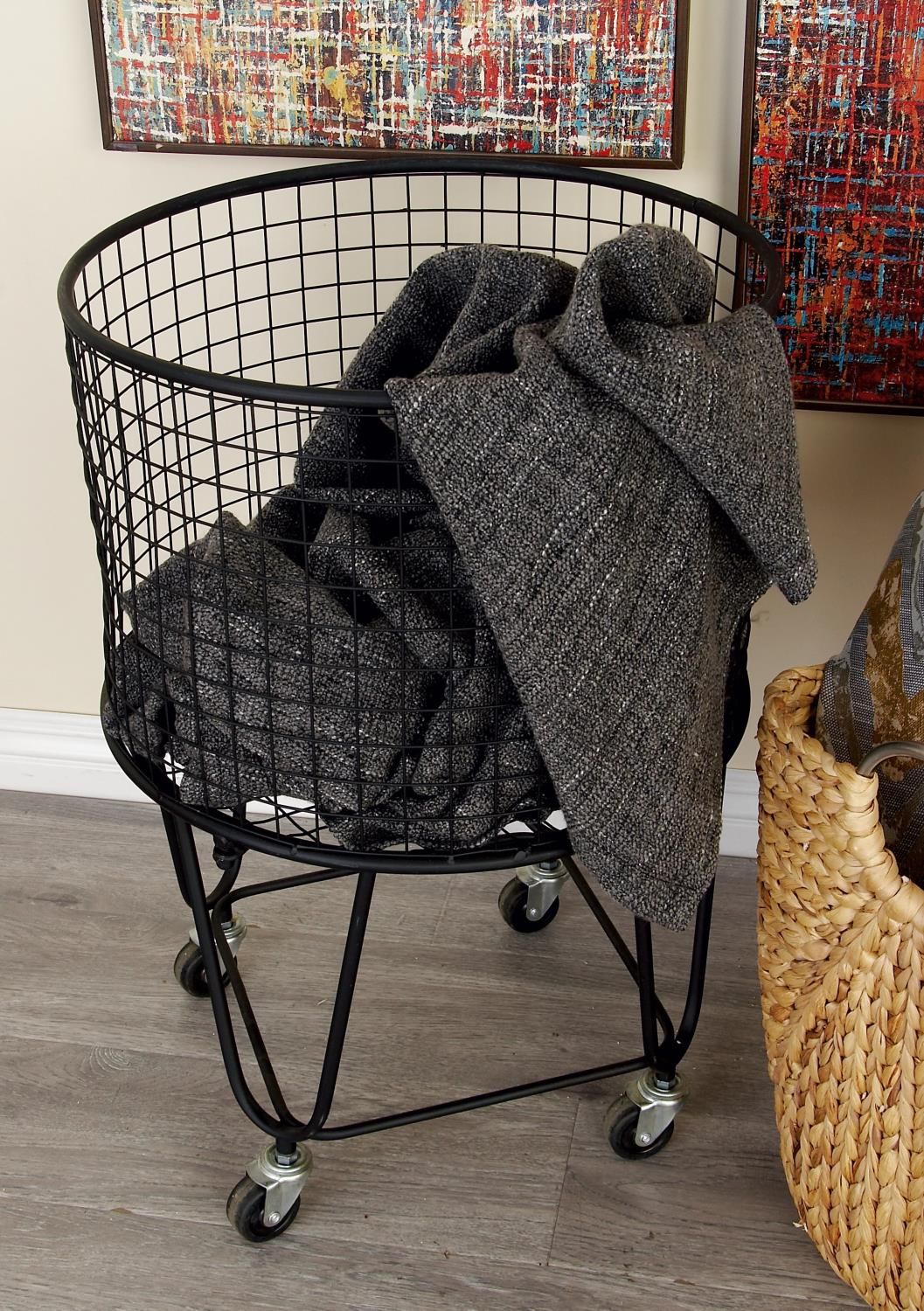 Even your dirty clothes deserve some style This large rolling laundry basket is the perfect touch in your industrial or modern space, as the metal finish, solid black hue, and open mesh design fit your style requirements while serving a *very* functional purpose. The round hamper basket is strong and sturdy for heavyweight loads of laundry and is extra easy to get around with 360-degree swivel caster wheels. We 100% guarantee youll look fly while doing your laundry. FeaturesFeatures a metal roll Rolling Laundry Basket, Laundry Basket Storage, Laundry Cart, Storage Cart, Laundry Hamper, Storage Baskets, Laundry Rooms, Industrial Storage, Industrial Metal