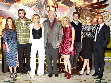 Jennifer Lawrence Turns It Out in Sexy White Pantsuit for First Mockingjay Photocall With Liam Hemsworth, Elizabeth Banks, and Natalie Dormer #whitepantsuit