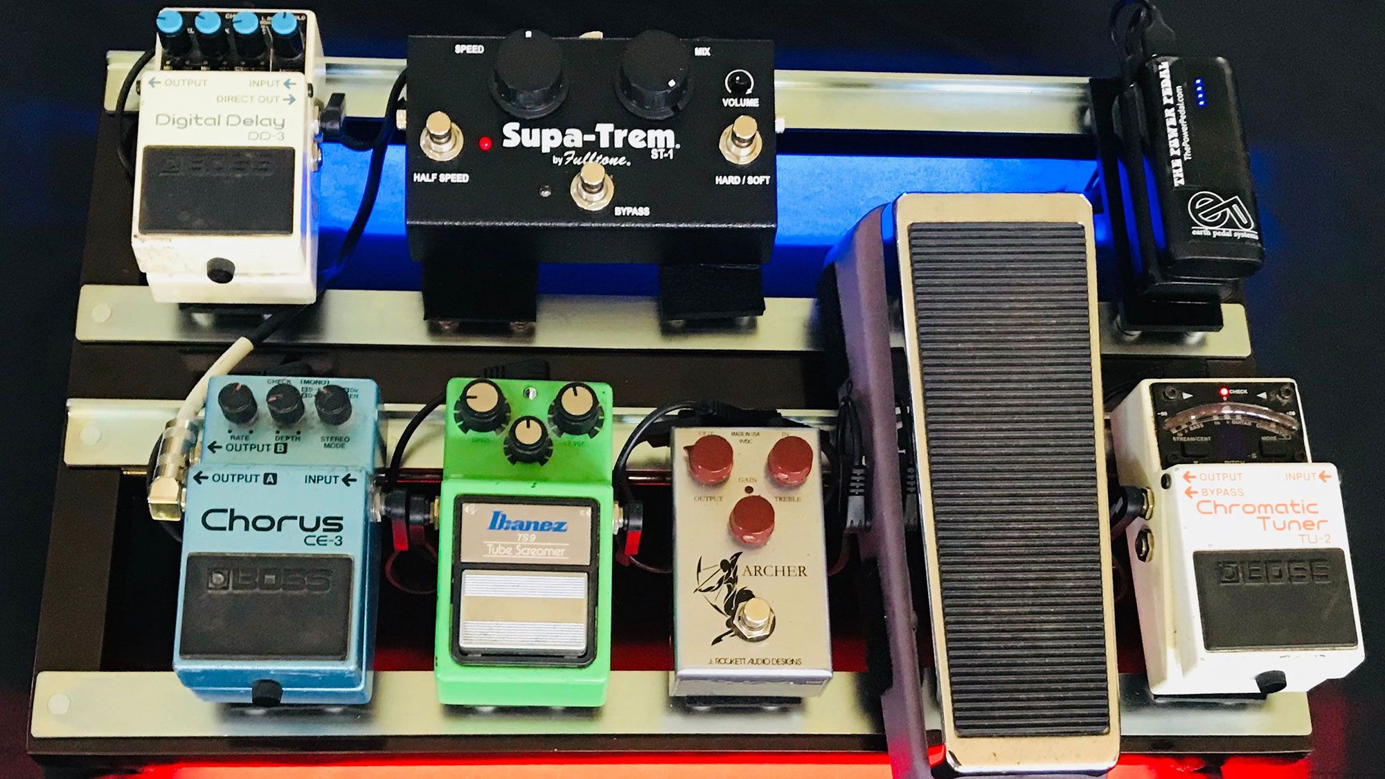 Meet Earthboard, the First Ever Magnetically-Powered and Designed Pedalboard. Earthboard incorporates rare earth magnets, a steel-rail system and a long-lasting rechargeable battery for a cordless design. First Ever, Rare Earth Magnets, Guitar Pedals, Pedalboard, Tuner, Cordless, The One, Battery, Meet