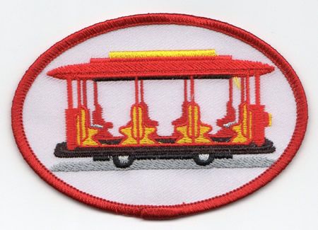 Red fleece Sweater with a Trolley Patch.