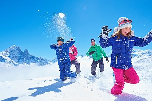 Family Having Snowball Fight Chamonix France Family Ski