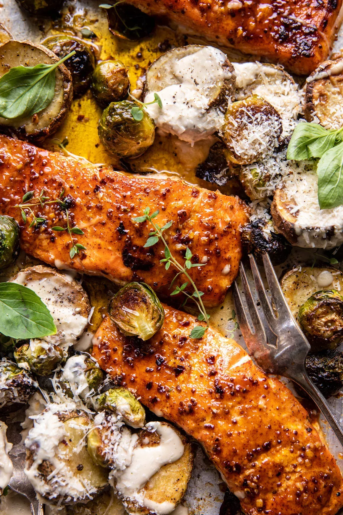 Sheet Pan Honey Mustard Salmon with Caesar Roasted Potatoes: Everything cooks together all at once, making this a delicious fuss-free dinner!
