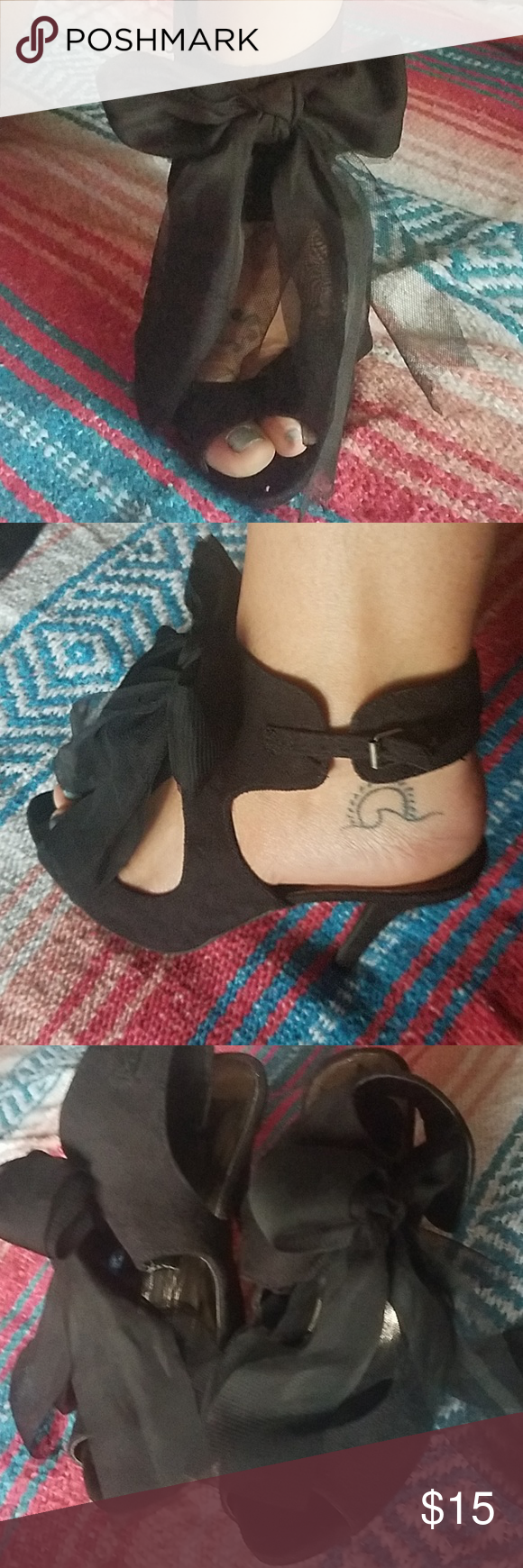 black heels with bow on side