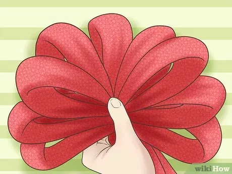 How to Make a Bow for a Christmas Tree Topper #howtomakeabowwithribbon