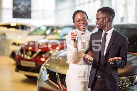 Key Car Dealership >> Visiting Car Dealership Couple Holding Key Of Their New Car Key Car Dealership >> Visiting Car Dealership Couple Holding Key Of Their New Car