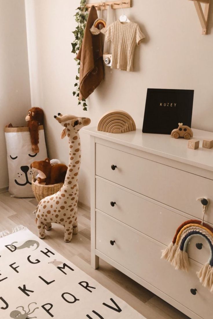 Woodland nursery decor is one of the nursery themes that help in creating a stimulating atmosphere and place for the children. Woodland nursery themes decor are eclectic, fanciful, playful, and absolutely relaxing. nursery room ideas neutral - safari nursery boy - woodland baby nursery - modern boho nursery girl - playroom decor ideas #babyroomthemes #nurseryroomideas #neutralsafarinursery #kidsroominteriordesign Baby Room Themes, Baby Girl Room Decor, Baby Boy Room Nursery, Baby Room Design, Baby Bedroom, Baby Boy Rooms, Kid Room Decor, Kids Bedroom, Eclectic Baby Nursery