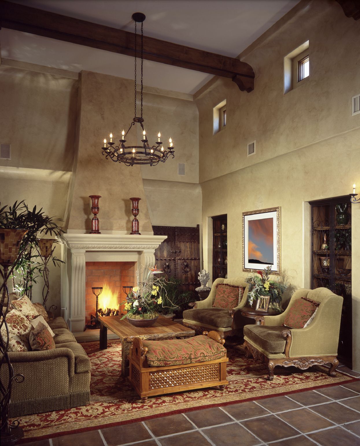 Brick Backed Open Fireplace With Ornate Mantle Heavy Wood Doors And Carved Foot Ch Tuscan Living Rooms Western Living Room Decor Quality Living Room Furniture