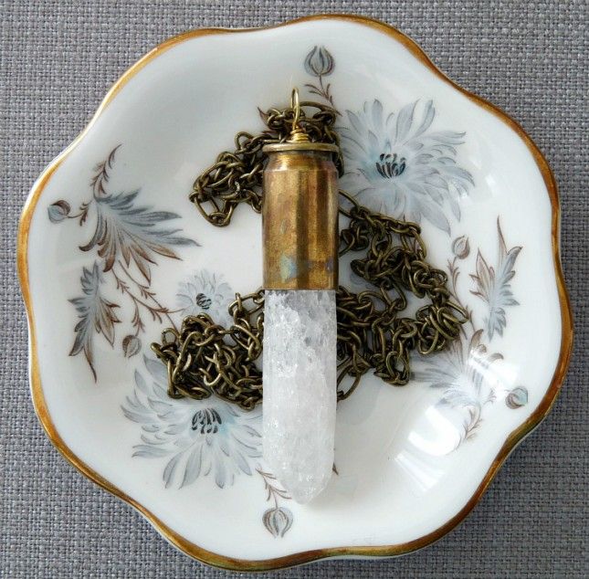 Turn bullet shells into something bright and beautiful with this crystal DIY necklace. Bullet Casing Jewelry, Bullet Necklace, Rock Crystal Necklace, Crystal Jewelry, Shell Jewelry, Crystal Pendant, Pendant Jewelry, Necklace Tutorial, Diy Necklace