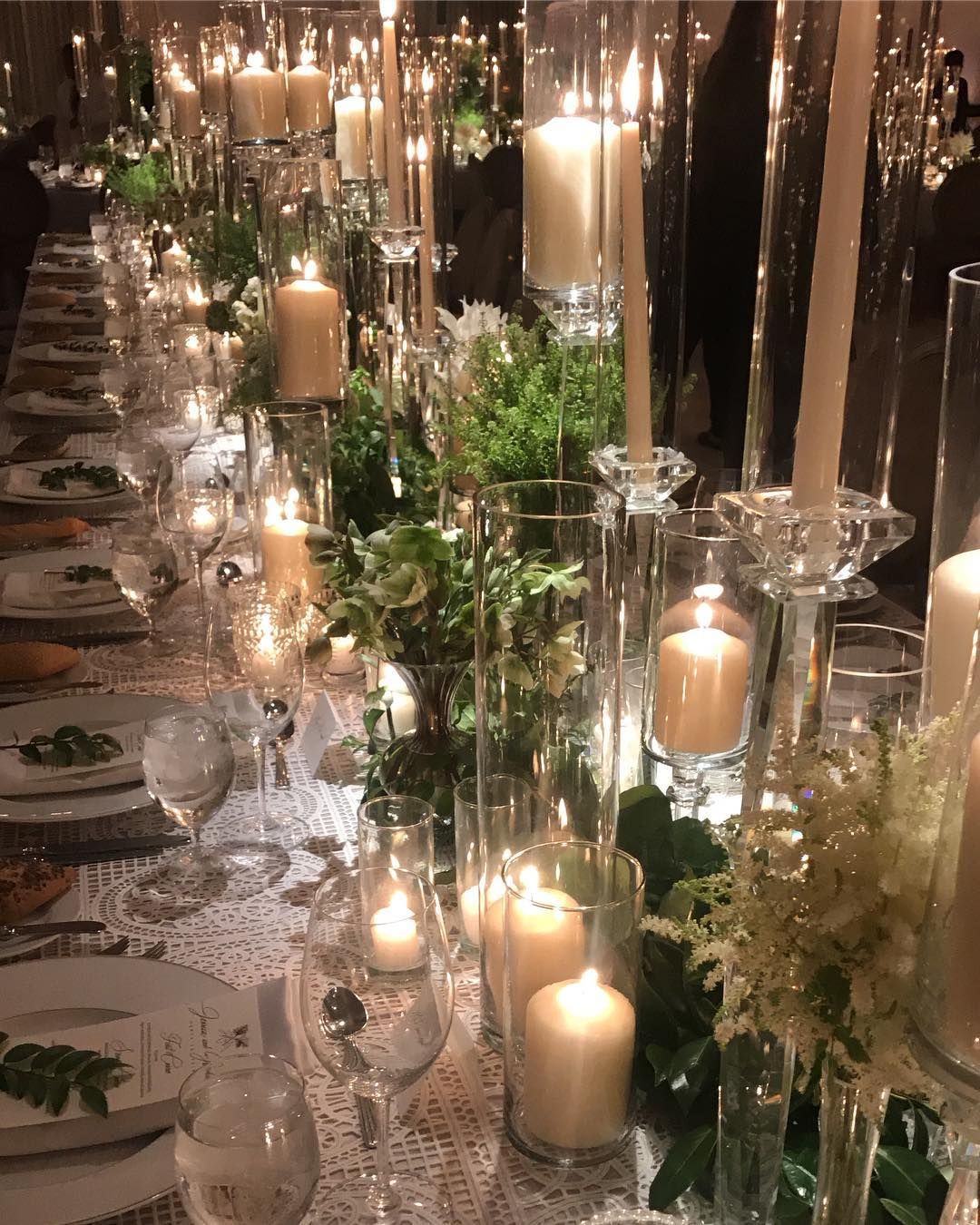 Mindy Weiss On Instagram Dinner Table Filled With Candles And Greens A Touch Of Floral Flower Centerpieces Wedding Wedding Table Settings Candle Lit Wedding