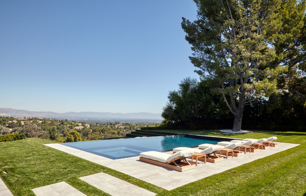 Inside Scott Disick’s Hamptons-Inspired Hidden Hills Home | Architectural Digest Scott Disick, East Coast Style, Midcentury Interior, Casual Living Rooms, Infinity Edge Pool, Ski House, Reality Tv Stars, Traditional Exterior, Clapboard