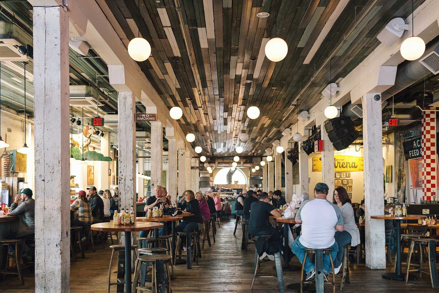 The First Floor Of Acme Feed Seed A Honkytonk Style Restaurant With Food And Beer To Be Eaten On Communal Tables The First Floor Of Acme Feed Seed A Honkytonk Style Restaurant With Food And Beer To Be Eaten On Communal Tables