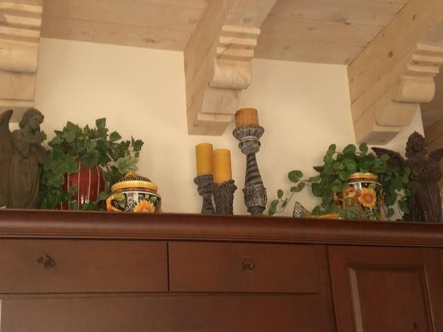 decorating above kitchen cabinets tuscany | decor above kitchen