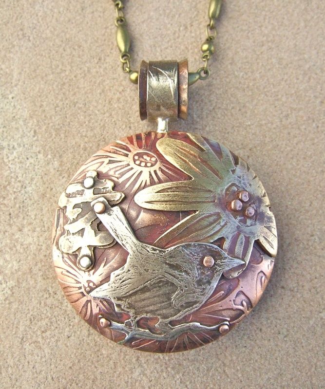 Stamped clay pendant with brass bird etched charm