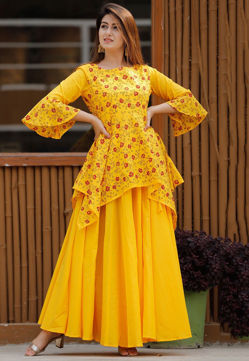 Cotton Asymmetric Tunic in Mustard This Readymade Attire is Highlighted with Hand Block Print. Crafted in Boat Neck and Bell Sleeves Available with a Cotton Skirt in Mustard Do Note: All accessories shown in image is for presentation purpose only ( Slight variation in actual color vs. image is possible) Party Wear Indian Dresses, Indian Gowns Dresses, Designer Party Wear Dresses, Kurti Designs Party Wear, Dress Indian Style, Indian Designer Outfits, Indian Fashion Dresses, Fancy Dresses, Stylish Dresses For Girls Pakistani