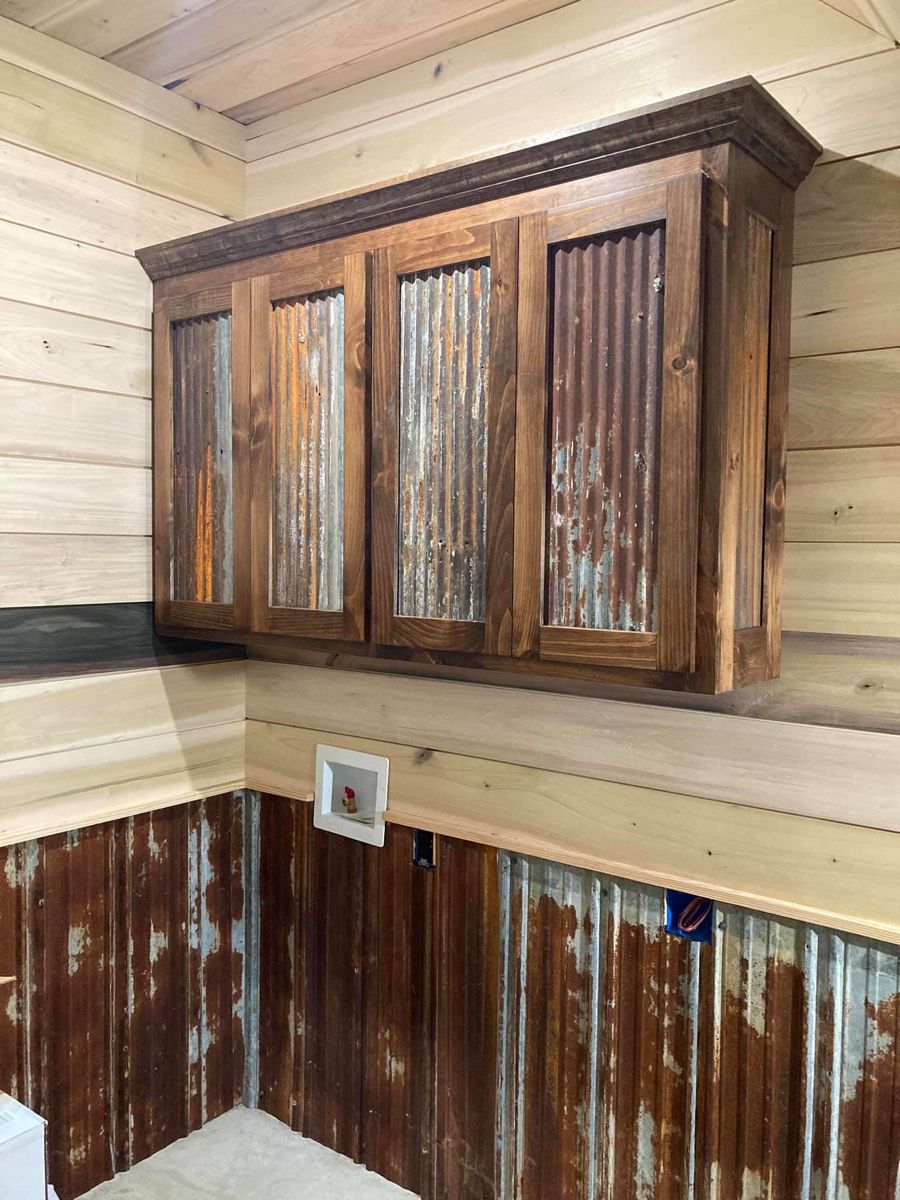 Rustic tin wooden laundry room