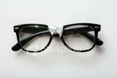 A Pair Of Nerdy Black Glasses Tape Together At The Bridge