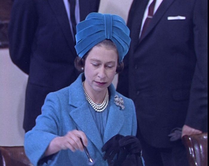 The Queen's Hats - British Pathé - The Queen work this Royal blue turban-style hat during a visit to Canada #queenshats