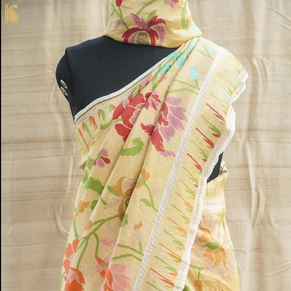 Designed to suit the tastes of our modern customers and crafted to perfection, this Banarasi attire is as stunning when draped as it looks in flat. The rich black color in pure Tussar silk is nothing less than captivating. Fabric - Pure Tussar Silk Tussar silk is an exquisite thread obtained from a wide-winged moth that is slightly yellowish-brown in color. Tussar is mainly valued for its texture, charm and natural gold color, which is unusually rich and deep. It is the primary kind in the silk Exquisite, Stunning, Natural Gold, Cutwork, Natural Fabrics, Zari, Lustrous, Moth, Gold Color