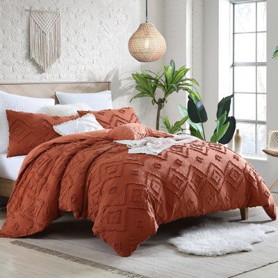 Style your bedroom with this lovely cotton jacquard gauze clips comforter set. The comforter features a clip design in a lovely diamond shape, creating a chic and modern look. Coordinating decorative pillows and matching shams complete the look and add a finishing touch to your home decor. Color: Rust, Size: King Comforter + 2 King Shams + 2 Throw Pillows | Cathay Sports Rukai Cotton Clip Jacquard Gauze 5-Piece Comforter Set Polyester/Polyfill/Cotton in Brown | Wayfair | Home Decor Burnt Orange Bedroom, Bedroom Green, Room Ideas Bedroom, Burnt Orange Comforter, Green Comforter Bedroom, Orange Bedroom Decor, Master Bedroom, Bedroom Inspo, Earth Tone Bedroom