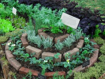 An herb spiral is a way to grow herbs that takes up less space and provides various types of planting conditions. Photo by: Amy Whitworth Potager Garden, Garden Edging, Veggie Garden, Raised Garden, Permaculture Garden, Permaculture Design, Herbs Garden, Raised Bed, Herb Spiral