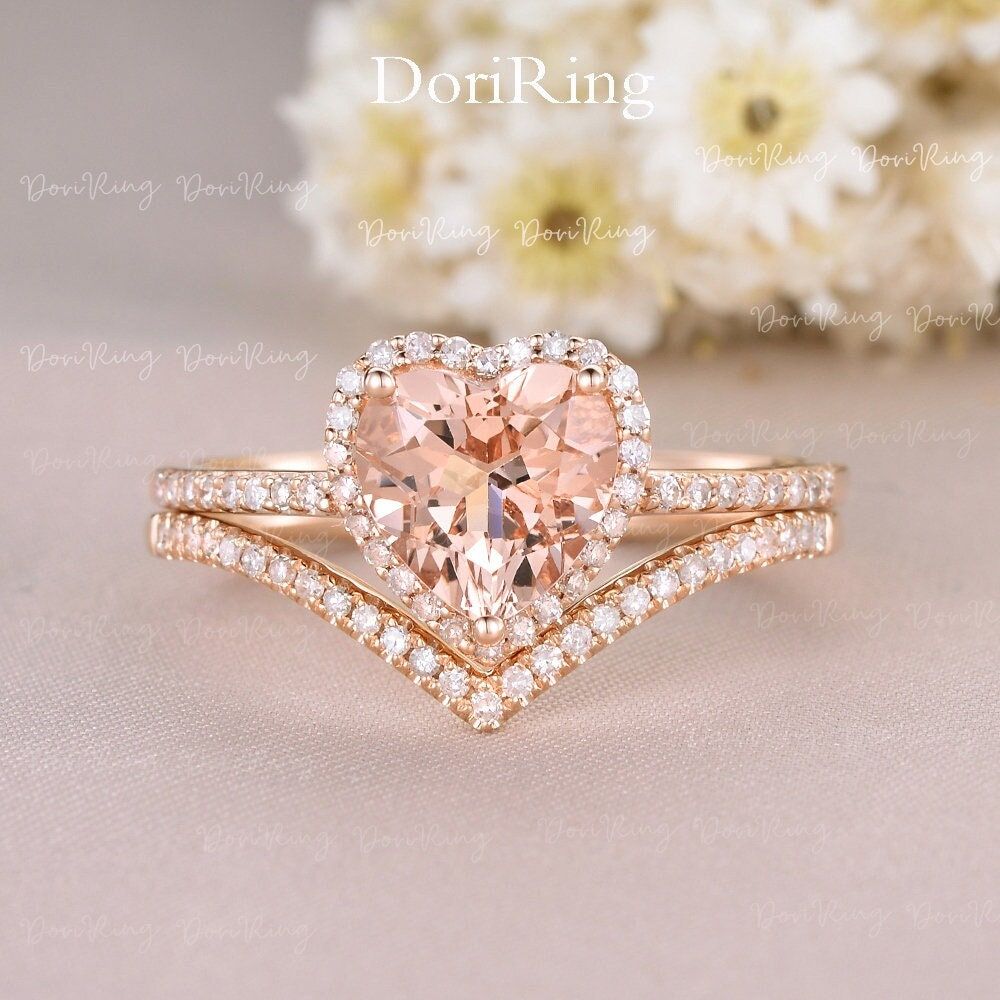 2CT Heart-Shaped Engagement Ring Set Morganite Rose Gold Halo Half Eternity Diamond Bridal Ring Art Deco Chevron Shaped Antique V Shaped Engagement Ring *Metal Type: Solid 14K Rose Gold *Band Width: 1.3mm *Center Stone: *Natural Morganite *Diameter: 8 mm *Color: Peachy Pink *Shaped: Heart-shaped *Side Stone: Natural Diamond *Weight: 0.22CT *Clarity: SI-VS *Color: G-H Wedding Band *Band Width: 1.3mm Side Stone: Natural Diamond *Weight: 0.13CT *Cut: Round cut *SI-H Natural conflict-free diamonds T Engagement Ring Metal Types, Heart Shaped Engagement Rings, Heart Shaped Diamond Ring, Cute Engagement Rings, Heart Wedding Rings, Heart Shaped Rings, Rose Gold Diamond Ring, Pink Ring, Rose Gold Engagement Ring