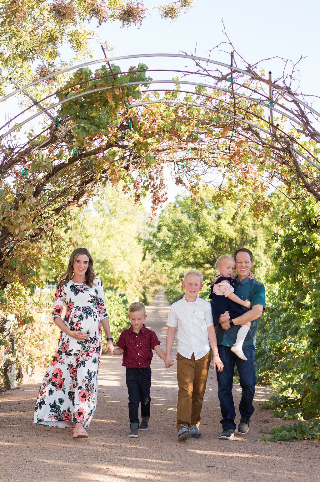 Beautiful family maternity photo shoot at the Farm at Agritopia behind Joe's Farm Grill in