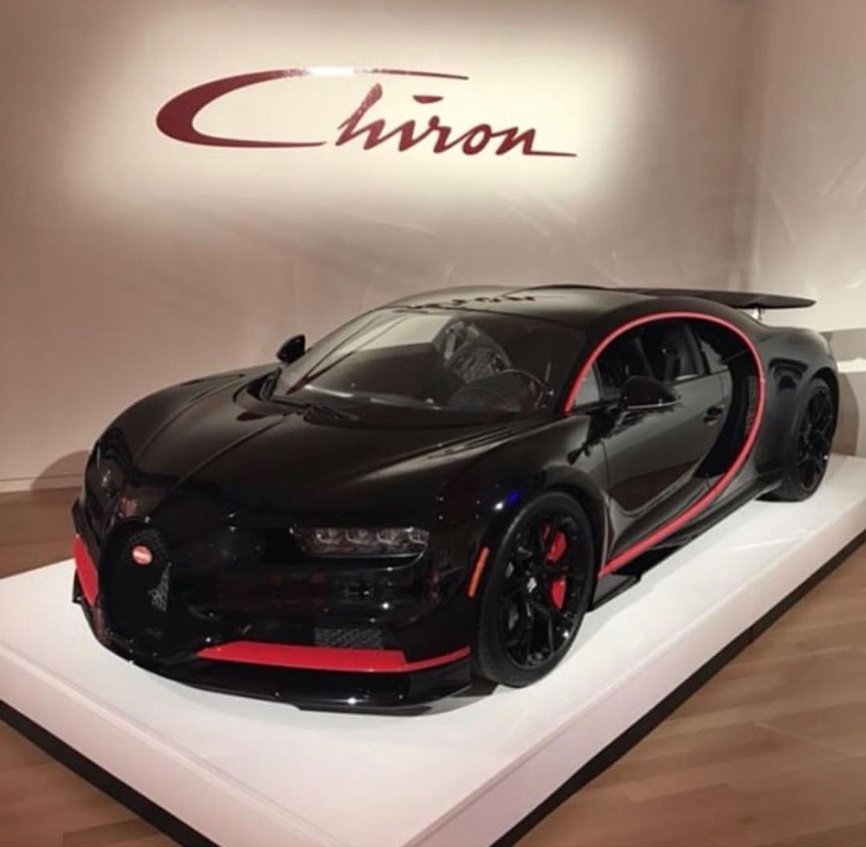 Red And Black Bugatti Chiron Bugatti Chiron painted in Black w/ Red accents Photo taken by: @dm.44