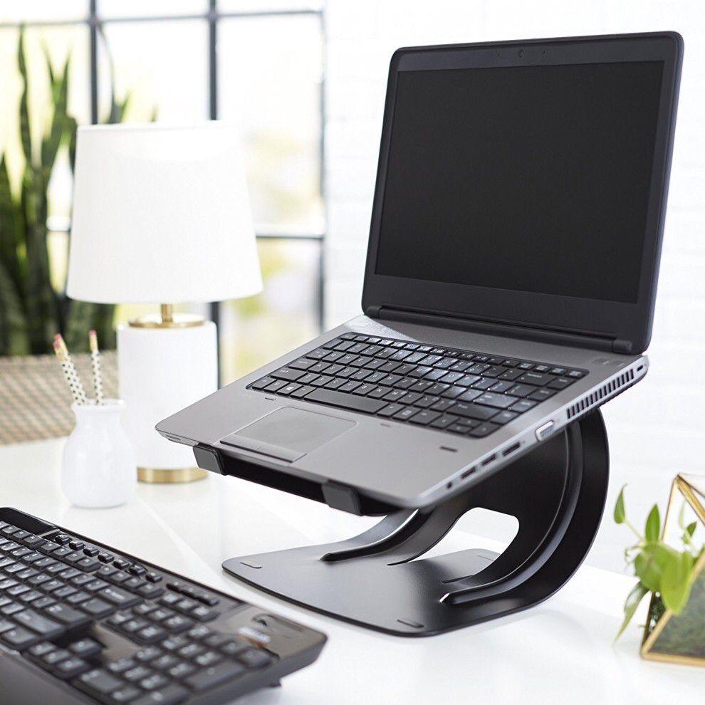 A Laptop Stand That Ll Raise Your Computer By Six Inches Giving