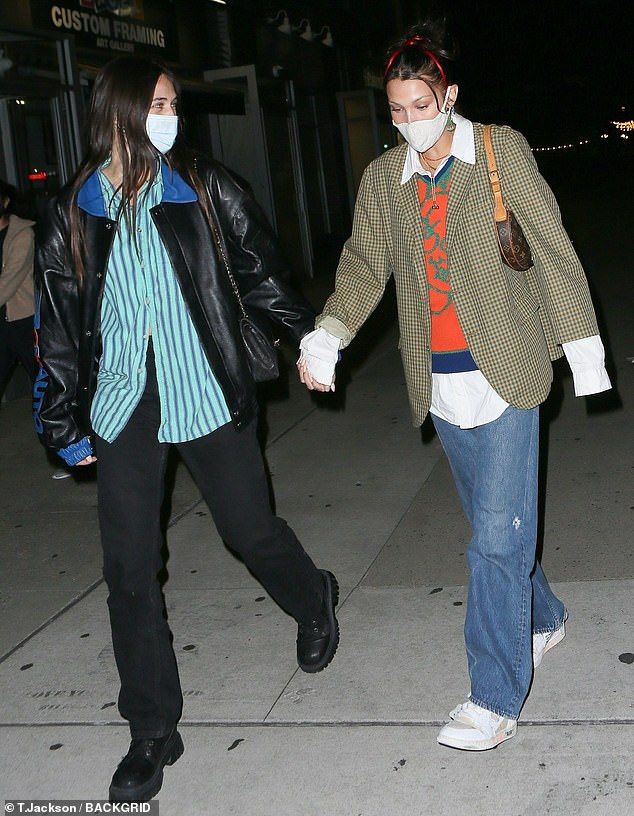 Bella Hadid wears a blazer as she rides a scooter Bella Hadid wears a blazer as she rides a scooter