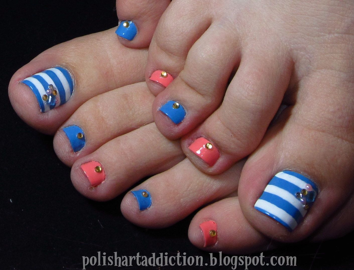 blue white stripes pink toenails