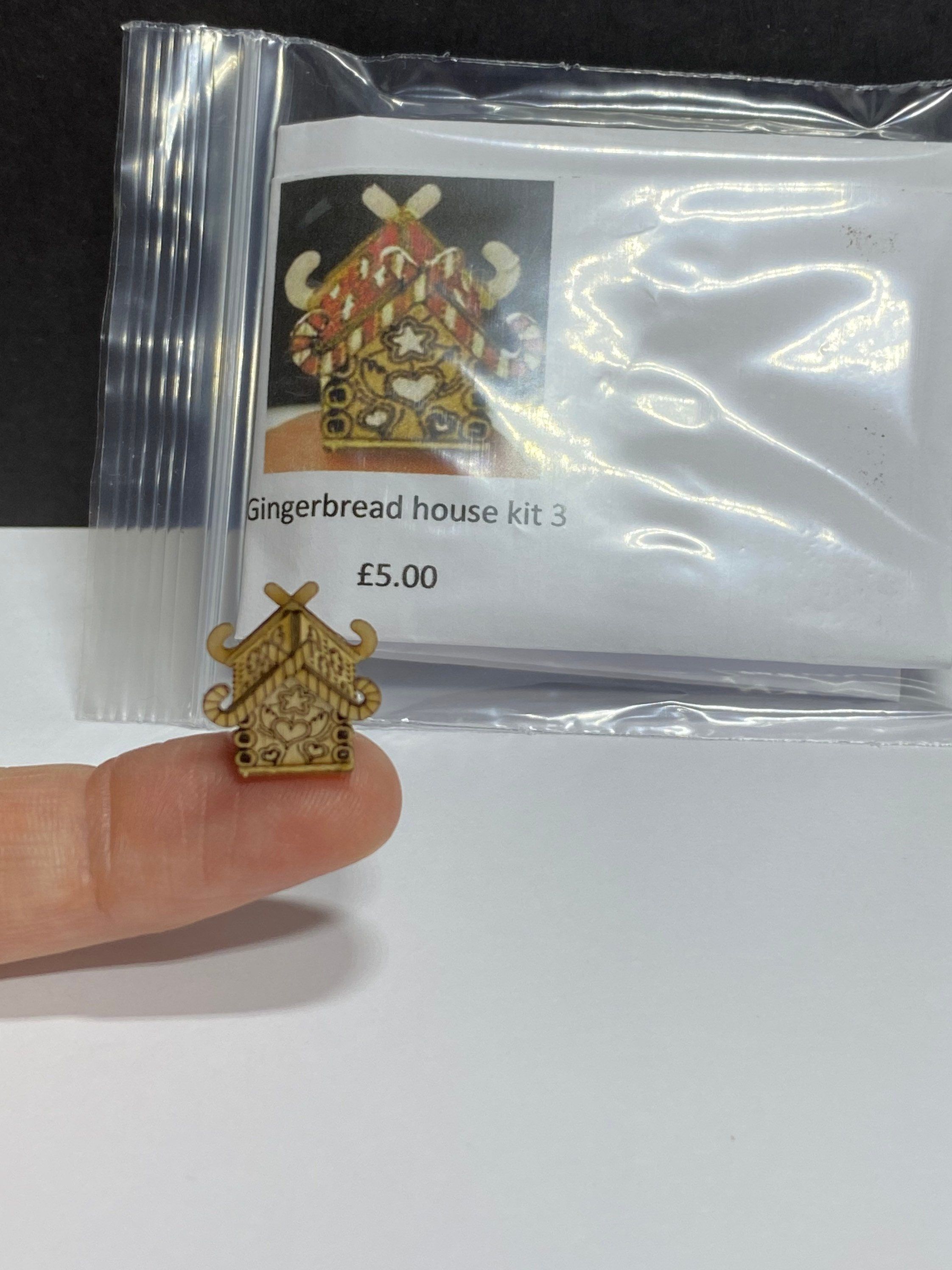 Hi everyone. Here we have a tiny gingerbread dollshouse kit for you to make your own masterpiece. The house would look lovely as a tiny dollshouse in a 1:48th scale setting. You will receive full instructions with photographs on how to construct your house as well as the kit itself. The house itself when constructed, measures 1cm small. This listing is for gingerbread house C. There are four gingerbread in the collection, and a tiny bridge if you would like to collect them all. Truly adorable an Ornament Kit, Ornaments, Gingerbread House Kits, Make Your Own, Make It Yourself, Thing 1, Bank Holiday, Masterpiece, Home Diy