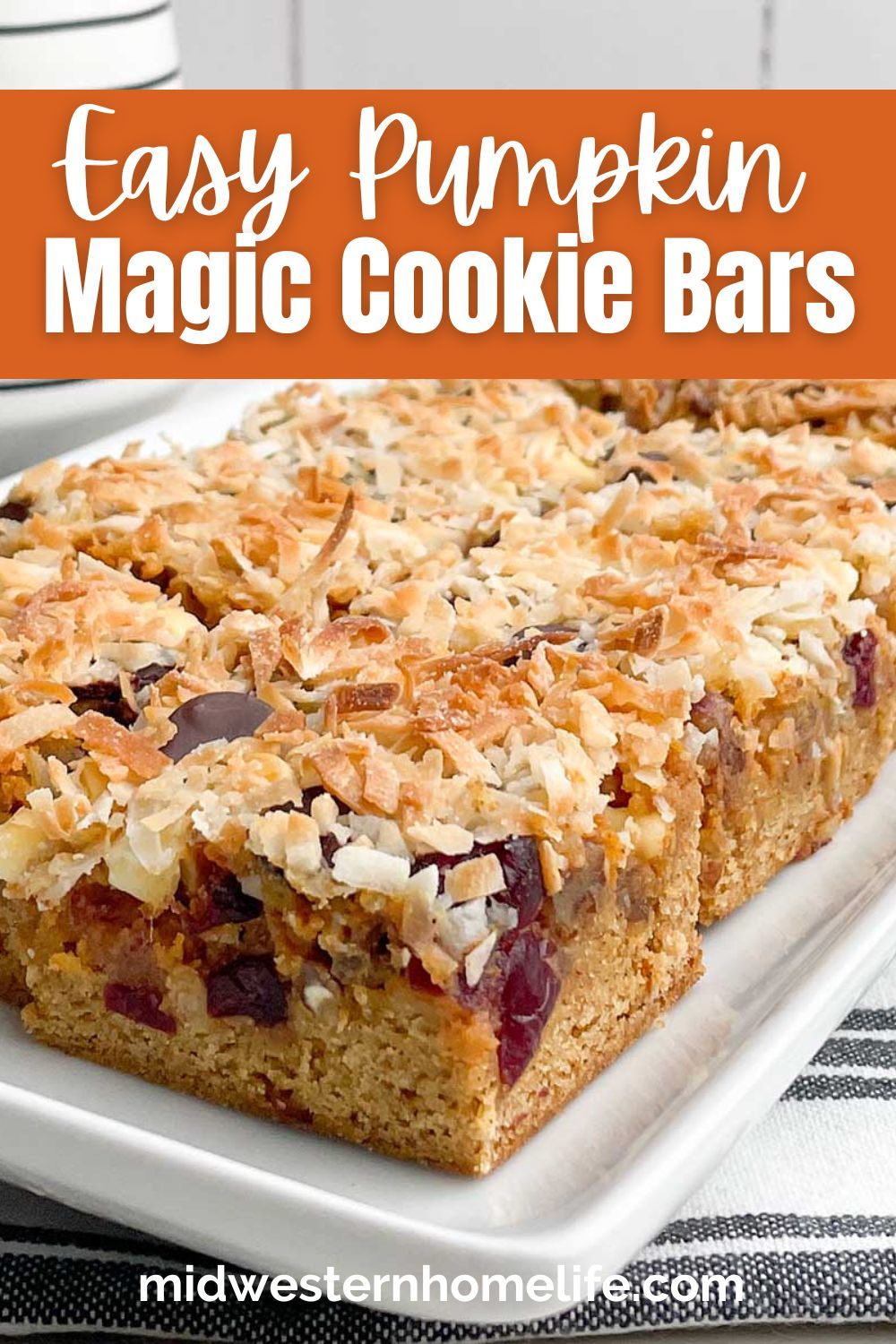Magic Pumpkin Bars is an easy yellow cake mix recipe with a gooey pumpkin sweetened condensed milk center, and topped with pecans, cranberries, white and dark chocolate chips, and coconut. Perfect pumpkin dessert for the holiday season or any time of year. Easy Bar Recipes, Cake Mix Recipes, Dessert Recipes Easy, Cookie Recipes, Pumpkin Bars, Pumpkin Dessert, Easy Pumpkin, Pumpkin Recipes, Cookies