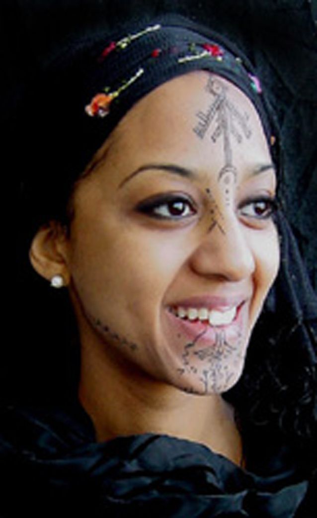 algerian women with a tribal tattoo. | | musing over intriguing
