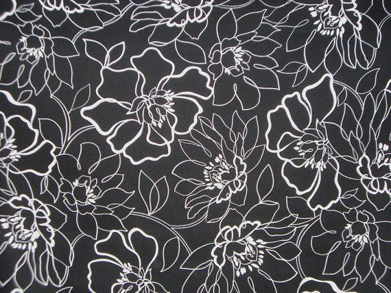 Black and white floral print stretch cotton pique fabric Black and white floral print stretch cotton pique fabric